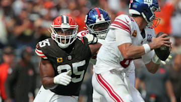 Cleveland Browns defensive end Myles Garrett (95) closes in on New York Giants quarterback Daniel Jones (8) during the second half of an NFL football game at Huntington Bank Field, Sunday, Sept. 22, 2024, in Cleveland, Ohio.