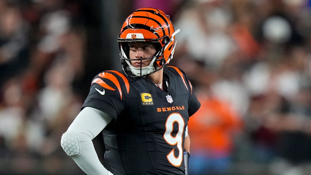Cincinnati Bengals quarterback Joe Burrow (9) stands by between plays in the second quarter of the NFL Week 3 game between the Cincinnati Bengals and the Washington Commanders at Paycor Stadium in downtown Cincinnati on Monday, Sept. 23, 2024. The Commanders led 21-13 at halftime.
