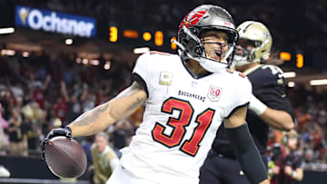 Oct 26, 2025; New Orleans, Louisiana, USA; Tampa Bay Buccaneers safety Antoine Winfield Jr. (31) reacts after a touchdown during the second quarter against the New Orleans Saints at Caesars Superdome. Mandatory Credit: Stephen Lew-Imagn Images