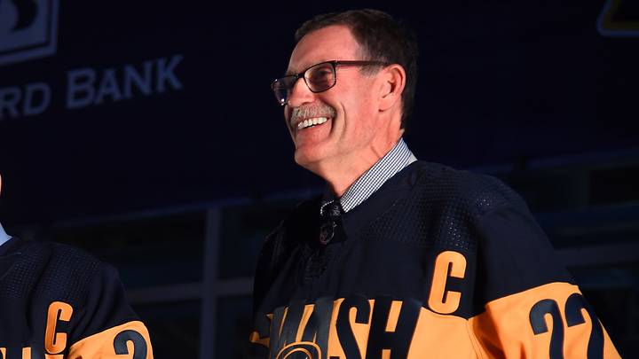 Dec 2, 2021; Nashville, Tennessee, USA; Nashville Predators former assistant coach Brent Peterson helps reveal the Stadium Series jersey the Nashville Predators will wear when they play the Tampa Bay Lightning in February before the game against the Boston Bruins on Thursday at Bridgestone Arena. Mandatory Credit: Christopher Hanewinckel-USA TODAY Sports Dec 2, 2021; Nashville, Tennessee, USA; Nashville Predators former assistant coach Brent Peterson helps reveal the Stadium Series jersey the Nashville Predators will wear when they play the Tampa Bay Lightning in February before the game against the Boston Bruins on Thursday at Bridgestone Arena. Mandatory Credit: Christopher Hanewinckel-USA TODAY Sports