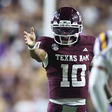 Oct 25, 2025; Baton Rouge, Louisiana, USA; Texas A&M Aggies quarterback Marcel Reed (10) celebrates after a first down during the first half against the Louisiana State Tigers at Tiger Stadium. Mandatory Credit: Stephen Lew-Imagn Images