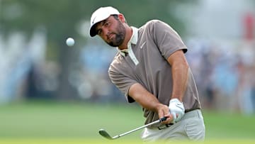 Scottie Scheffler chips onto the green on the 18th hole during the final round of the Texas Children's Houston Open golf tournament.. 