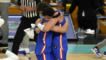 Florida Gators guard Walter Clayton Jr. and center Micah Handlogten react after defeating the Houston Cougars in the national championship game of the Final Four of the 2025 NCAA Tournament at the Alamodome.Imagn Images