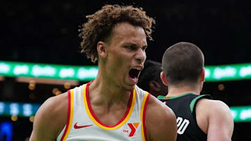 Dyson Daniels #5 of the Atlanta Hawks reacts against the Boston Celtics.