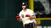 Sep 5, 2025; Arlington, Texas, USA;  Texas Rangers left fielder Wyatt Langford (36) reacts after hitting a double during the first inning against the Houston Astros at Globe Life Field. 