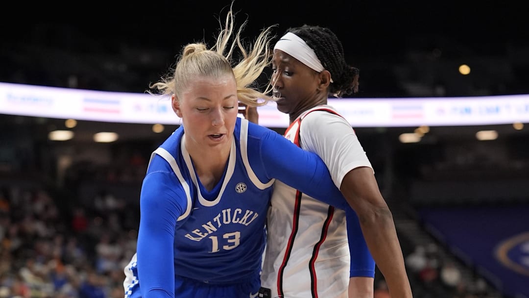 Mar 5, 2026; Greenville, SC, USA; Kentucky Wildcats center Clara Strack (13) goes to the basket against Georgia Bulldogs center Vera Ojenuwa (22) during the first half at Bon Secours Wellness Arena. Mandatory Credit: Jim Dedmon-Imagn Images