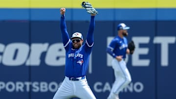 Mar 23, 2025; Dunedin, Florida, USA; Toronto Blue Jays outfielder George Springer celebrates after making a play against the Pittsburgh Pirates in the third inning during spring training at TD Ballpark. 