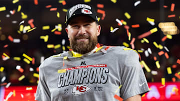Jan 26, 2025; Kansas City, MO, USA; Confetti falls as Kansas City Chiefs tight end Travis Kelce (87) celebrates after defeating the Buffalo Bills during the AFC Championship game at GEHA Field at Arrowhead Stadium. Mandatory Credit: Mark J. Rebilas-Imagn Images