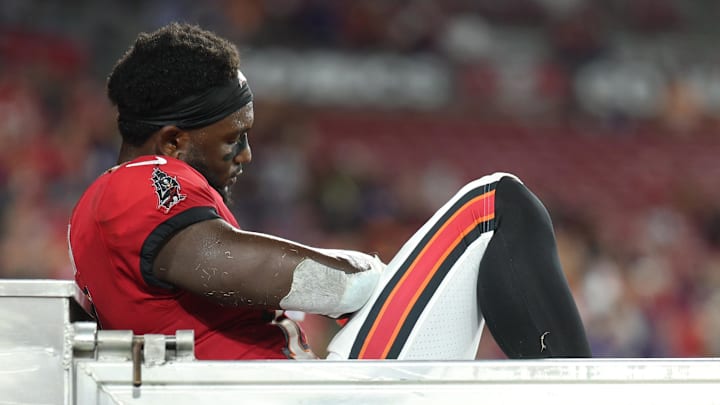 Oct 21, 2024; Tampa, Florida, USA; Tampa Bay Buccaneers wide receiver Chris Godwin (14) is carted off the field against the Baltimore Ravens in the fourth quarter at Raymond James Stadium. Mandatory Credit: Nathan Ray Seebeck-Imagn Images REPORT: Ravens LB Roquan Smith Won’t Be Fined for Season-Ending Hit on Bucs WR Chris Godwin! - NEWS USA
