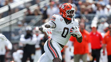 Sep 7, 2024; University Park, Pennsylvania, USA; Bowling Green Falcons tight end Harold Fannin Jr (0) runs with the ball during the second quarter against the Penn State Nittany Lions at Beaver Stadium. Mandatory Credit: Matthew O'Haren-Imagn Images