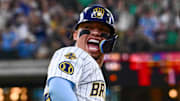 Milwaukee Brewers designated hitter William Contreras (24) celebrates a two-run home run against the New York Mets at American Family Field. 