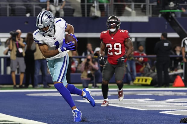 Dallas Cowboys wide receiver Jalen Tolbert catches a touchdown pass against Tampa Bay Buccaneers linebacker Lavonte David.