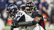 Dec 7, 2025; Atlanta, Georgia, USA; Seattle Seahawks tight end AJ Barner (88) is tackled by Atlanta Falcons linebacker Divine Deablo (0) during the second half at Mercedes-Benz Stadium. Mandatory Credit: Dale Zanine-Imagn Images