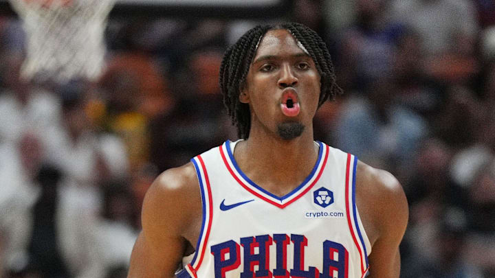 Apr 4, 2024; Miami, Florida, USA;  Philadelphia 76ers guard Tyrese Maxey (0) celebrates a