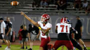 Orange Lutheran Lancers quarterback TJ Lateef (9) throws a pass against the Chandler Wolves during a football game at Chandler High in Chandler on Sept. 8, 2023.