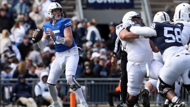 Penn State quarterback Drew Allar drops back with the football during a football game at Beaver Stadium.