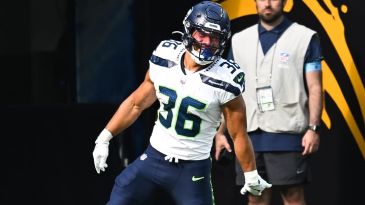 Aug 10, 2024; Inglewood, California, USA; Seattle Seahawks running back George Holani (36) makes a touchdown against the Los Angeles Chargers during the second quarter at SoFi Stadium. Mandatory Credit: Jonathan Hui-USA TODAY Sports