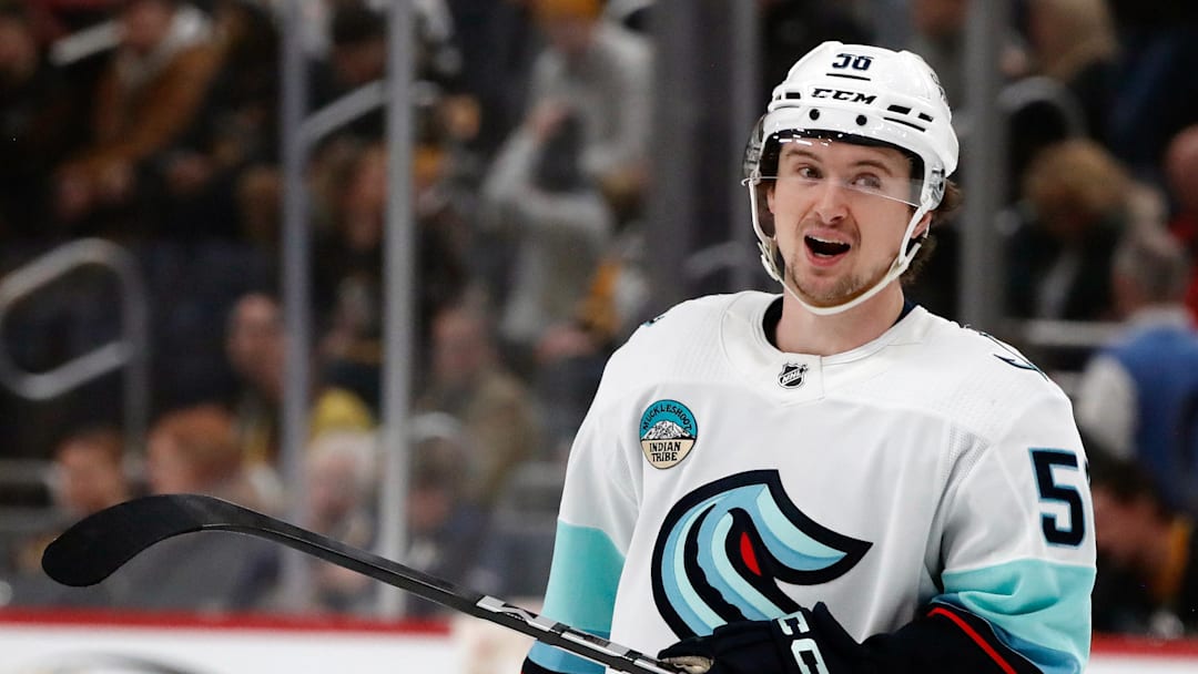 Jan 15, 2024; Pittsburgh, Pennsylvania, USA;  Seattle Kraken right wing Kailer Yamamoto (56) reacts on the ice against the Pittsburgh Penguins during the second period at PPG Paints Arena. Mandatory Credit: Charles LeClaire-Imagn Images