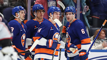 Jan 20, 2025; Elmont, New York, USA;  New York Islanders center Bo Horvat (14) celebrates with his teammates after scoring a goal in the second period against the Columbus Blue Jackets at UBS Arena. Mandatory Credit: Wendell Cruz-Imagn Images