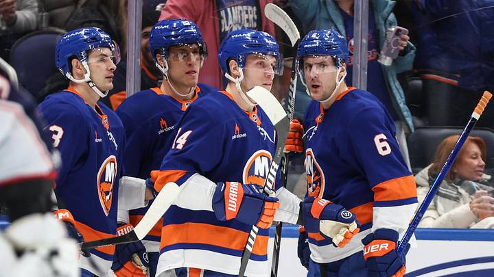 Jan 20, 2025; Elmont, New York, USA;  New York Islanders center Bo Horvat (14) celebrates with his teammates after scoring a goal in the second period against the Columbus Blue Jackets at UBS Arena. Mandatory Credit: Wendell Cruz-Imagn Images