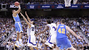 Apr 5, 2008; San Antonio, TX, USA; UCLA Bruins guard Russell Westbrook (0) shoots over Memphis Tigers guard Derrick Rose (23) during the second half of the semi-finals of the 2008 NCAA Mens Final Four Championship at the Alamodome.  Memphis defeated UCLA 78-63. Mandatory Credit: Bob Donnan-Imagn Images