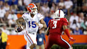 Florida Gators quarterback Anthony Richardson (15) looks to throw the ball on the run during a game against the Florida Atlantic Owls at Ben Hill Griffin Stadium in Gainesville Fla. Sept. 4, 2021.

UFfauGameAction47