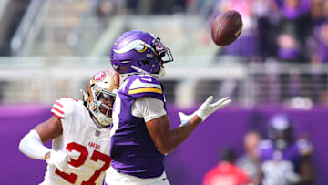 San Francisco 49ers safety Ji'Ayir Brown (L) chases Minnesota Vikings wide receiver Justin Jefferson (R)