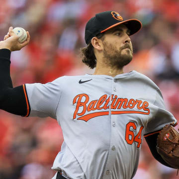 May 5, 2024; Cincinnati, Ohio, USA; Baltimore Orioles starting pitcher Dean Kremer (64) pitches against the Cincinnati Reds in the first inning at Great American Ball Park. Katie Stratman-USA TODAY Sports