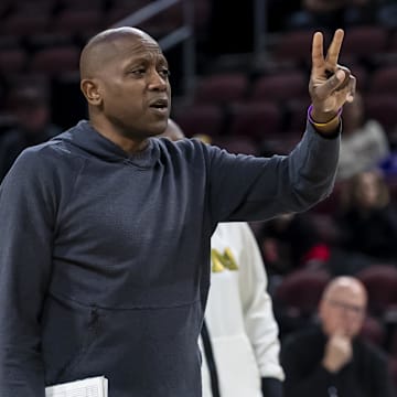 Mar 19, 2025; Wichita, KS, USA;  Missouri Tigers head coach Dennis Gates interacts with his players during a practice session at Intrust Bank Arena. Mandatory Credit: Nick Tre. Smith-Imagn Images