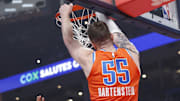 Nov 26, 2025; Oklahoma City, Oklahoma, USA; Oklahoma City Thunder center Isaiah Hartenstein (55) dunks against the Minnesota Timberwolves during the first quarter at Paycom Center.