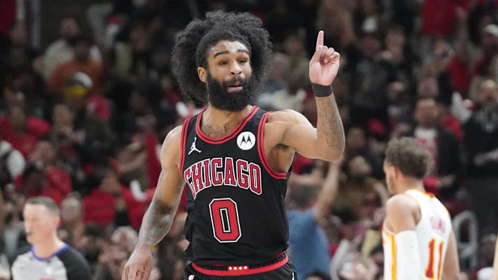 Apr 17, 2024; Chicago, Illinois, USA; Chicago Bulls guard Coby White (0) gestures after making a three-point basket against the Atlanta Hawks during the second half during a play-in game of the 2024 NBA playoffs at United Center. Mandatory Credit: David Banks-Imagn Images