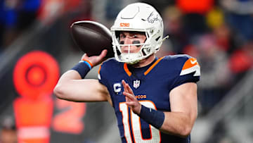 Dec 2, 2024; Denver, Colorado, USA; Denver Broncos quarterback Bo Nix (10) passes the ball in the first quarter against the Cleveland Browns at Empower Field at Mile High. 