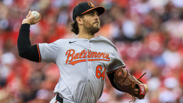 May 5, 2024; Cincinnati, Ohio, USA; Baltimore Orioles starting pitcher Dean Kremer (64) pitches against the Cincinnati Reds in the first inning at Great American Ball Park