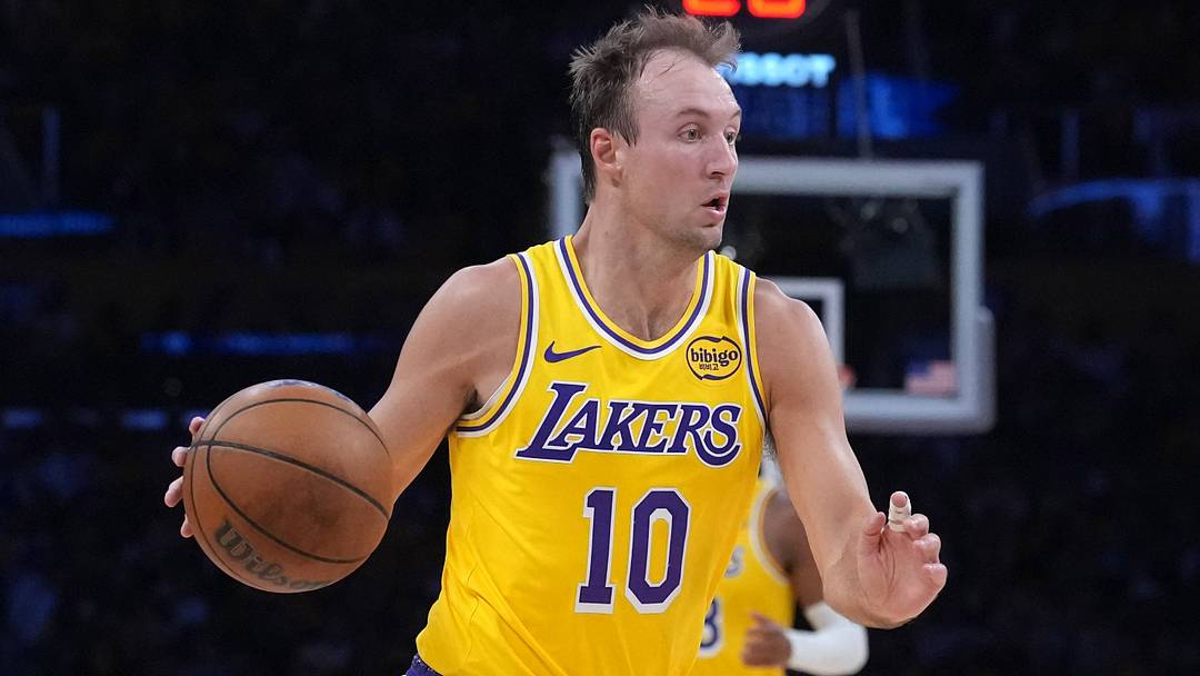 Apr 18, 2026; Los Angeles, California, USA; Los Angeles Lakers guard Luke Kennard (10) dribbles the ball against Houston Rockets guard Reed Sheppard (15) in the first half during game one of the first round of the 2026 NBA Playoffs at Crypto.com Arena. Mandatory Credit: Kirby Lee-Imagn Images