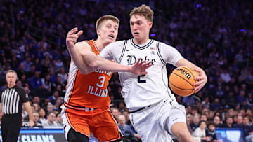 Feb 22, 2025; New York, NY, USA;  Duke Blue Devils guard Cooper Flagg (2) drives past Illinois Fighting Illini forward Ben Humrichous (3) in the first half at Madison Square Garden. 