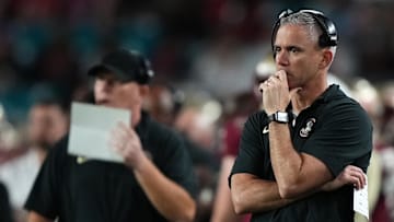 Dec 30, 2023; Miami Gardens, FL, USA; Florida State Seminoles head coach Mike Norvell reacts against