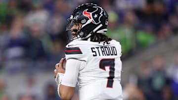 Oct 20, 2025; Seattle, Washington, USA; Houston Texans quarterback C.J. Stroud (7) looks to throw a pass during the second quarter against the Seattle Seahawks at Lumen Field. Mandatory Credit: Kevin Ng-Imagn Images