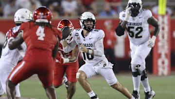 Sep 12, 2025; Houston, Texas, USA; Colorado Buffaloes quarterback Ryan Staub (16) scrambles with the ball during the fourth quarter against the Houston Cougars at TDECU Stadium. Mandatory Credit: Troy Taormina-Imagn Images