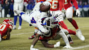 Jan 26, 2025; Kansas City, MO, USA; Buffalo Bills running back James Cook (4) dives for a touchdown against the Kansas City Chiefs during the second half in the AFC Championship game at GEHA Field at Arrowhead Stadium. Mandatory Credit: Denny Medley-Imagn Images