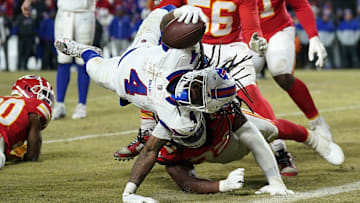 Jan 26, 2025; Kansas City, MO, USA; Buffalo Bills running back James Cook (4) dives for a touchdown against the Kansas City Chiefs during the second half in the AFC Championship game at GEHA Field at Arrowhead Stadium. Mandatory Credit: Denny Medley-Imagn Images