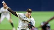 Aug 9, 2025; San Diego, California, USA; San Diego Padres relief pitcher Mason Miller (22) throws a pitch during the eighth inning against the Boston Red Sox at Petco Park. Mandatory Credit: David Frerker-Imagn Images
