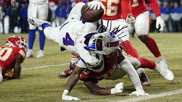 Jan 26, 2025; Kansas City, MO, USA; Buffalo Bills running back James Cook (4) dives for a touchdown against the Kansas City Chiefs during the second half in the AFC Championship game at GEHA Field at Arrowhead Stadium. Mandatory Credit: Denny Medley-Imagn Images