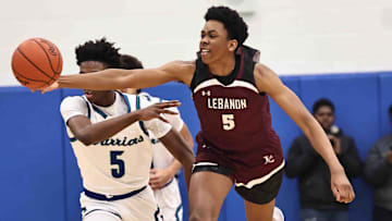 Lebanon forward Anthony Thompson (5) chases after a loose ball 