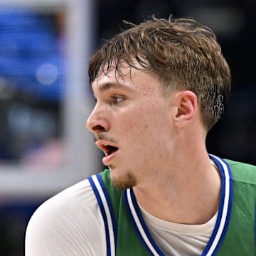 Dallas Mavericks forward Cooper Flagg moves the ball to the basket against the Toronto Raptors.