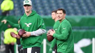 Philadelphia Eagles quarterback Tanner McKee (16) and quarterback Ian Book (13) during warmups against the Dallas Cowboys at Lincoln Financial Field. 