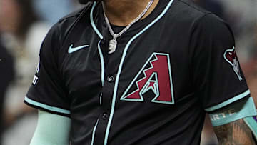 Aug 25, 2025; Milwaukee, Wisconsin, USA; Arizona Diamondbacks second base Ketel Marte (4) reacts after striking out against the Milwaukee Brewers in the seventh inning at American Family Field. Mandatory Credit: Michael McLoone-Imagn Images
