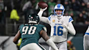 Nov 16, 2025; Philadelphia, Pennsylvania, USA; Detroit Lions quarterback Jared Goff (16) throws a pass under pressure form Philadelphia Eagles defensive tackle Jalen Carter (98) during the second half at Lincoln Financial Field. 