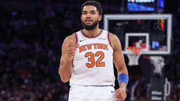 Dec 3, 2025; New York, New York, USA;  New York Knicks center Karl-Anthony Towns (32) reacts after scoring in the third quarter against the Charlotte Hornets at Madison Square Garden. Mandatory Credit: Wendell Cruz-Imagn Images