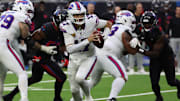 Buffalo Bills quarterback Josh Allen rushes against the Houston Texans in the second half at NRG Stadium. 