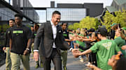 Sep 7, 2024; Eugene, Oregon, USA; Oregon Ducks head coach Dan Lanning high-fives fans as he leads his team before a game against the Boise State Broncos at Autzen Stadium. Mandatory Credit: Troy Wayrynen-Imagn Images